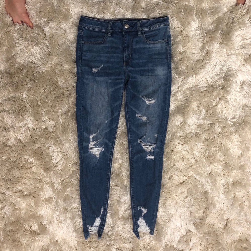AEO Super Stretch ripped skinny jeans.